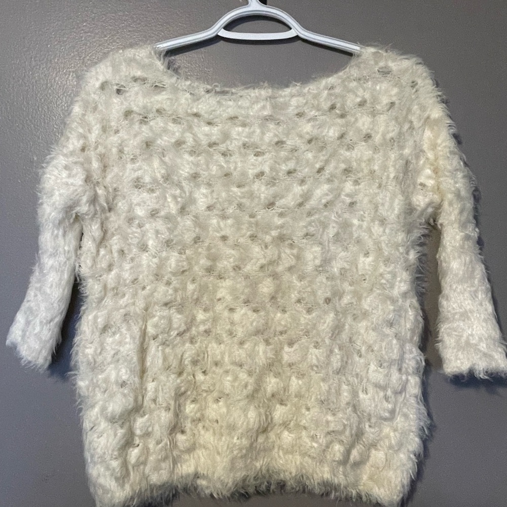Super soft holey sweater
